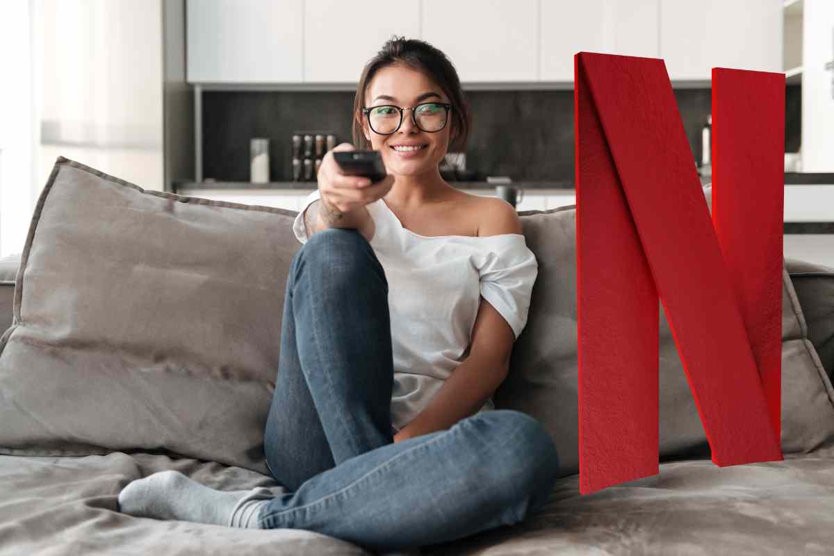ragazza guarda tv con logo netflix