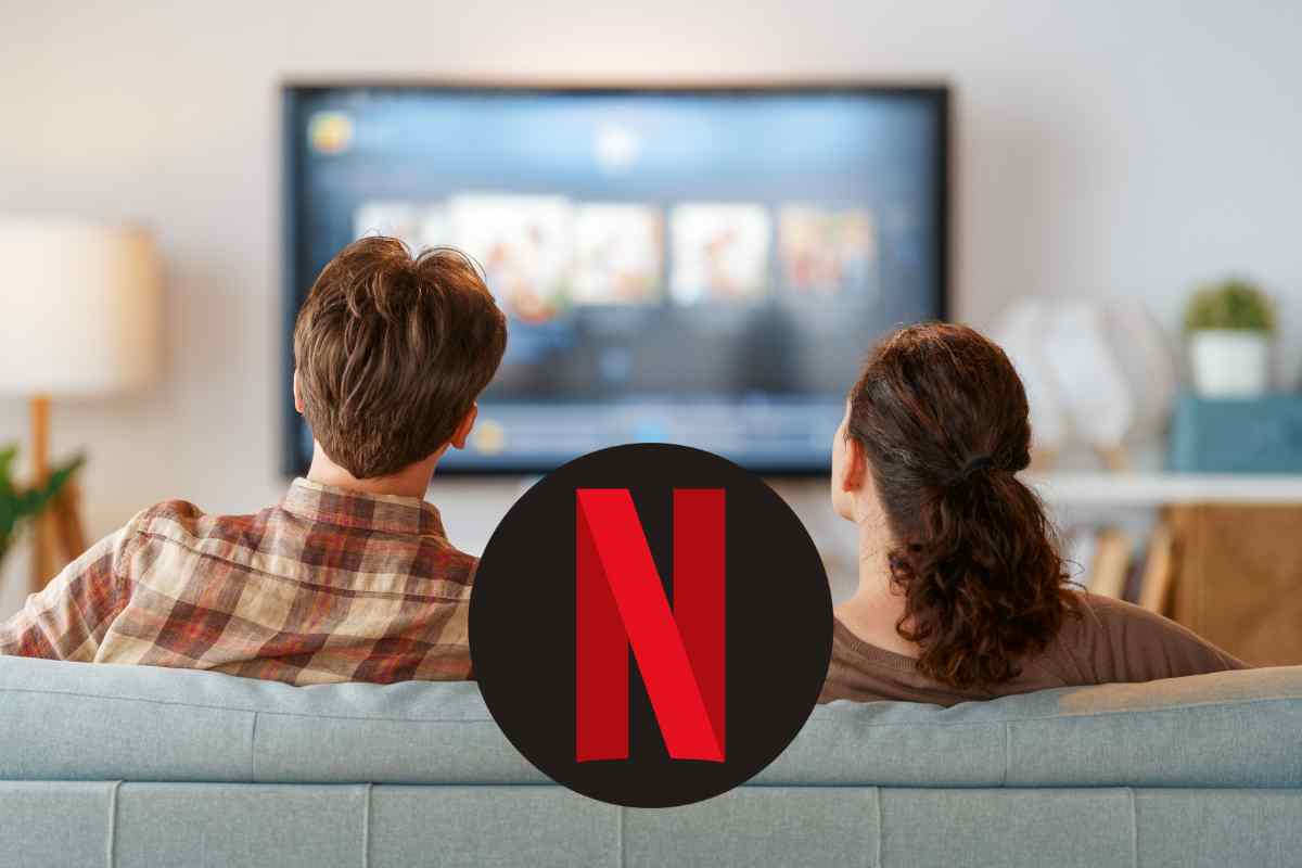 coppia guarda tv con logo netflix