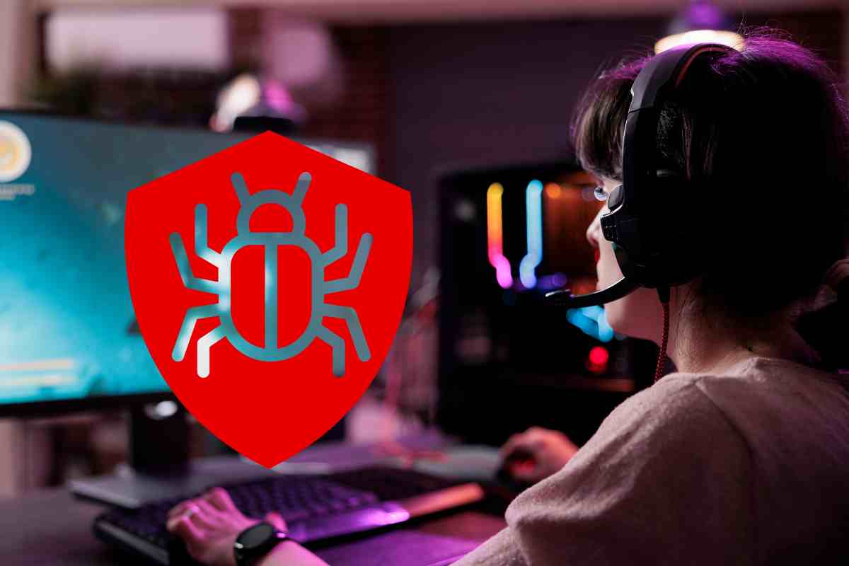 donna al pc e icona di un malware