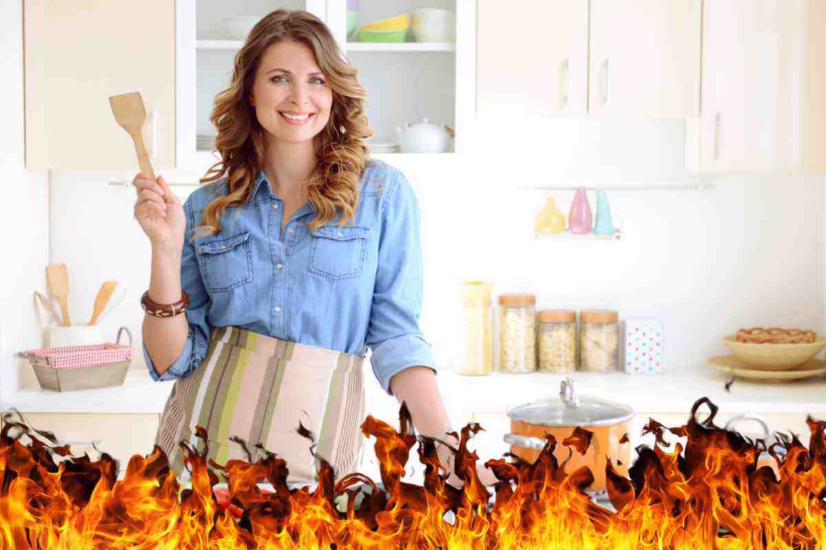 donna che cucina tra le fiamme