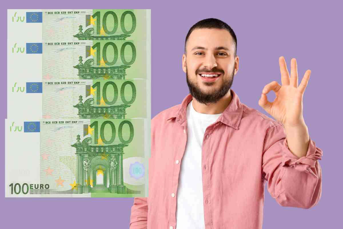 uomo che fa simbolo ok con 400 euro